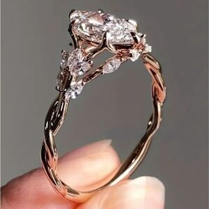Elegant rose golden diamond engagement ring sz 6